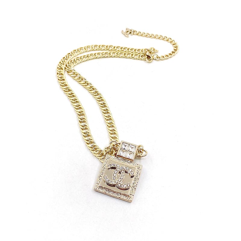 18K  Chanel Metal & Diamond Pendant Necklace