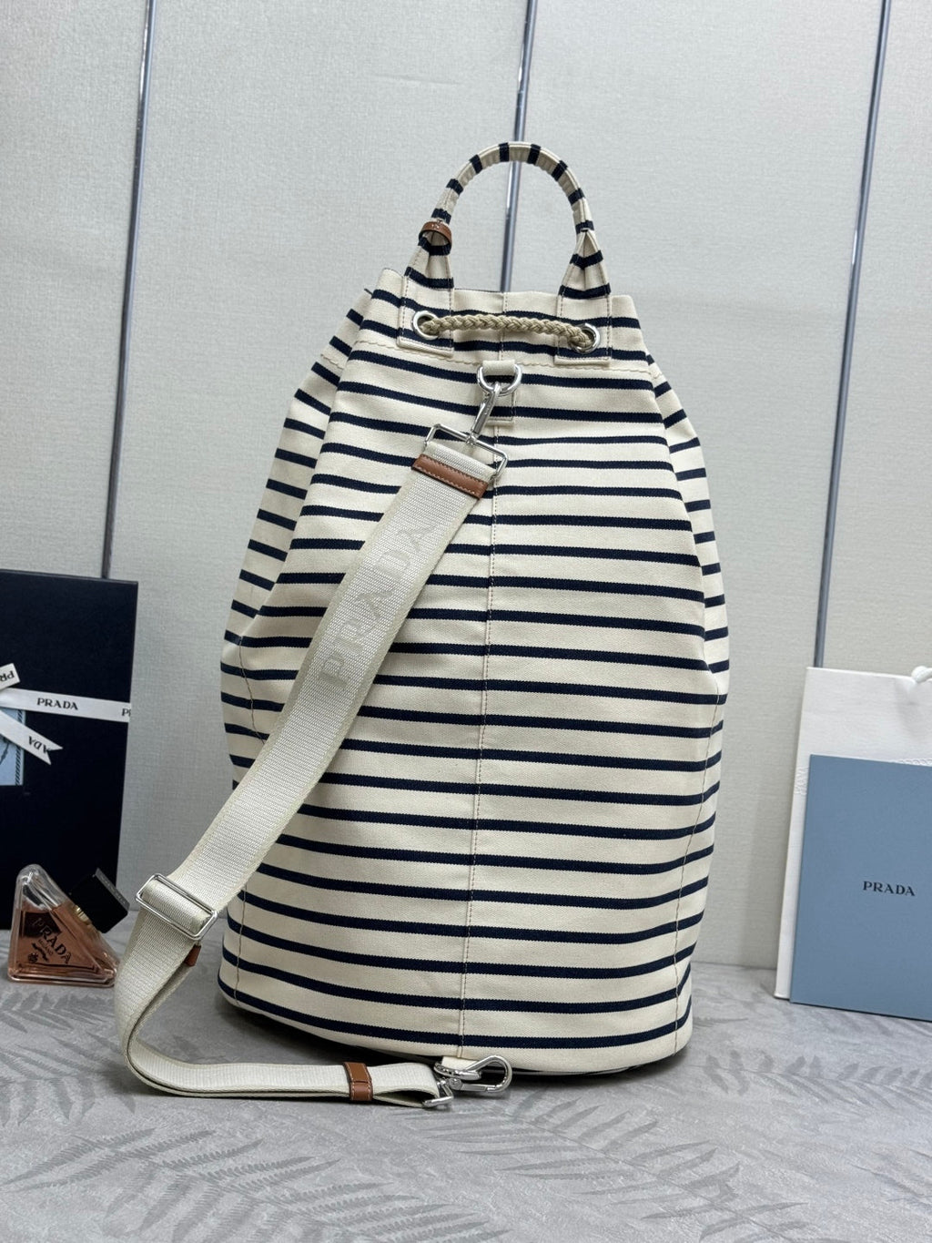 PRADA 25S DRAWSTRING BACKPACK 55 IN HORIZONTAL STRIPES CANVAS SILVER HARDWRE