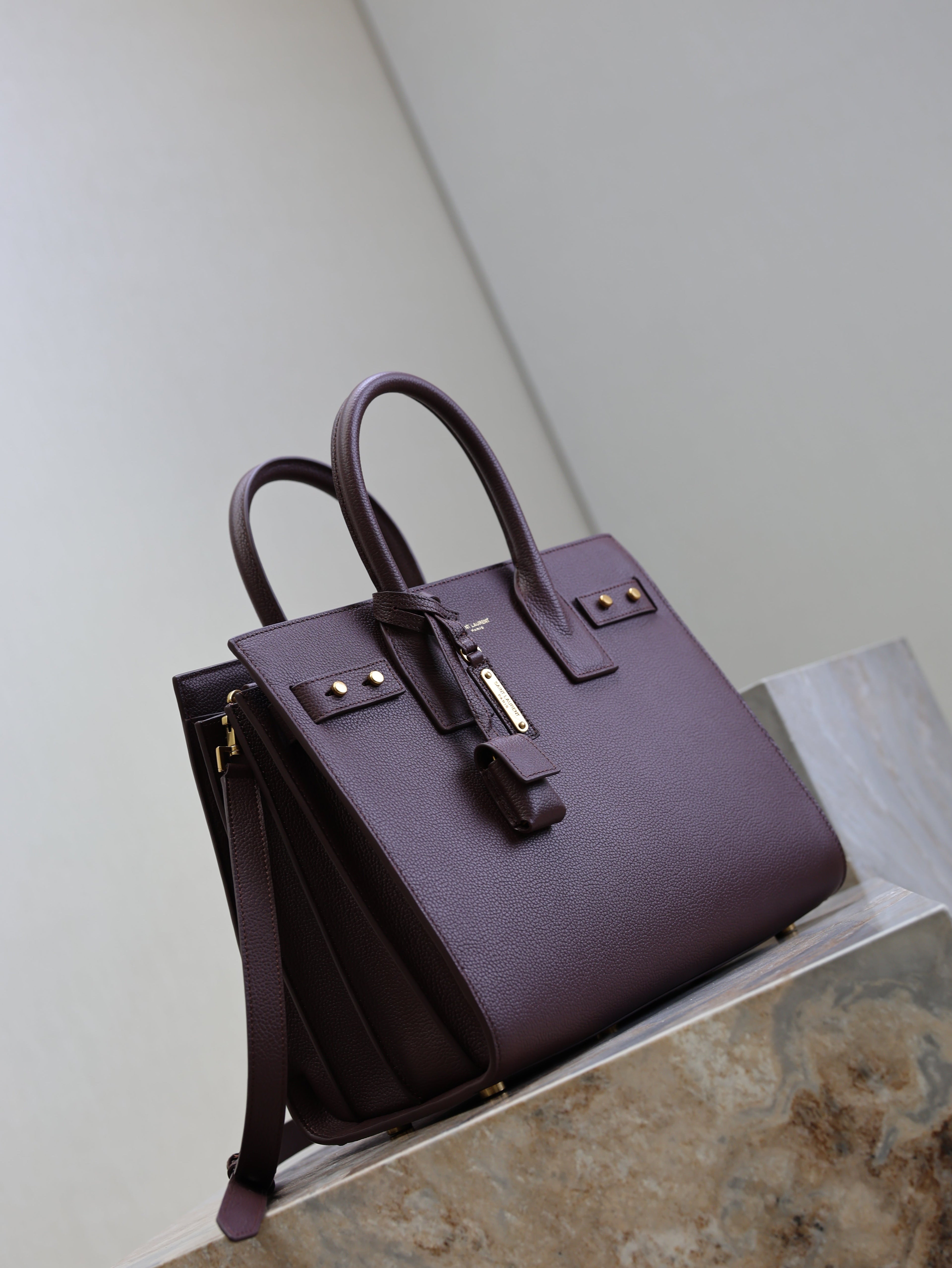 YSL 25S SAC DE JOUR GM 32 IN ROUGE CABERNET SUPPLE GRAINED CALFSKIN