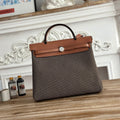 HERMES HERBAG MESSENGER 31 BAG IN DARK BROWN H VIKING CANVAS AND COWHIDE